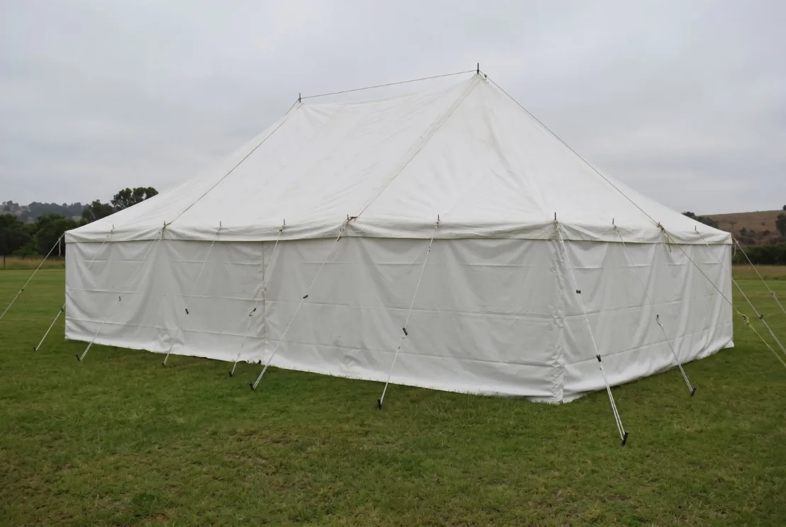 White 2-pole marquee tent set up on grass, available for hire in Durban and KZN
